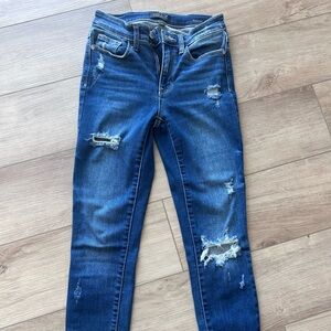 Distressed Blue Jeans